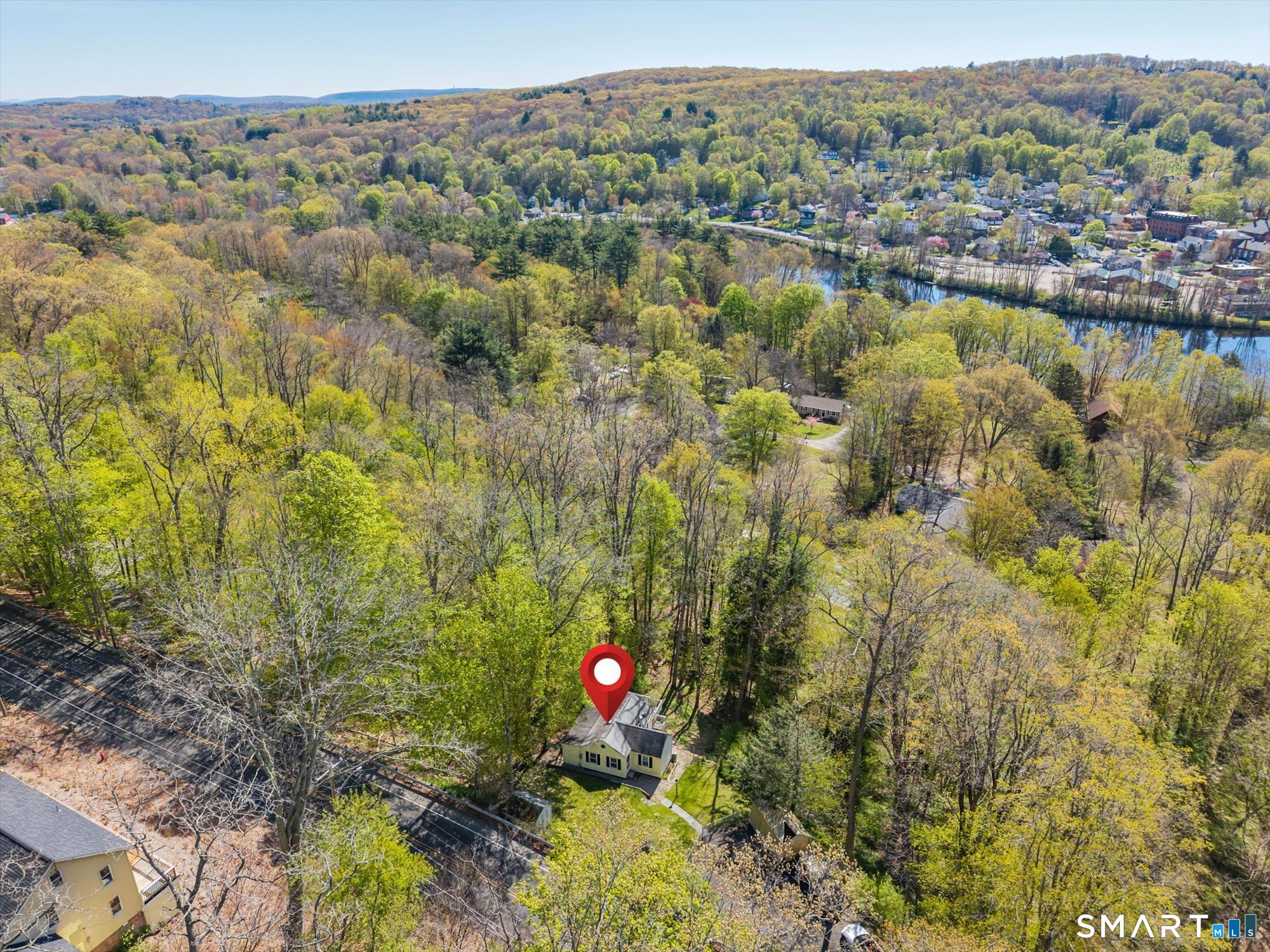 93 Torrington Avenue Canton, CT 06019 - Photo 3 of 24 a view of city and mountain