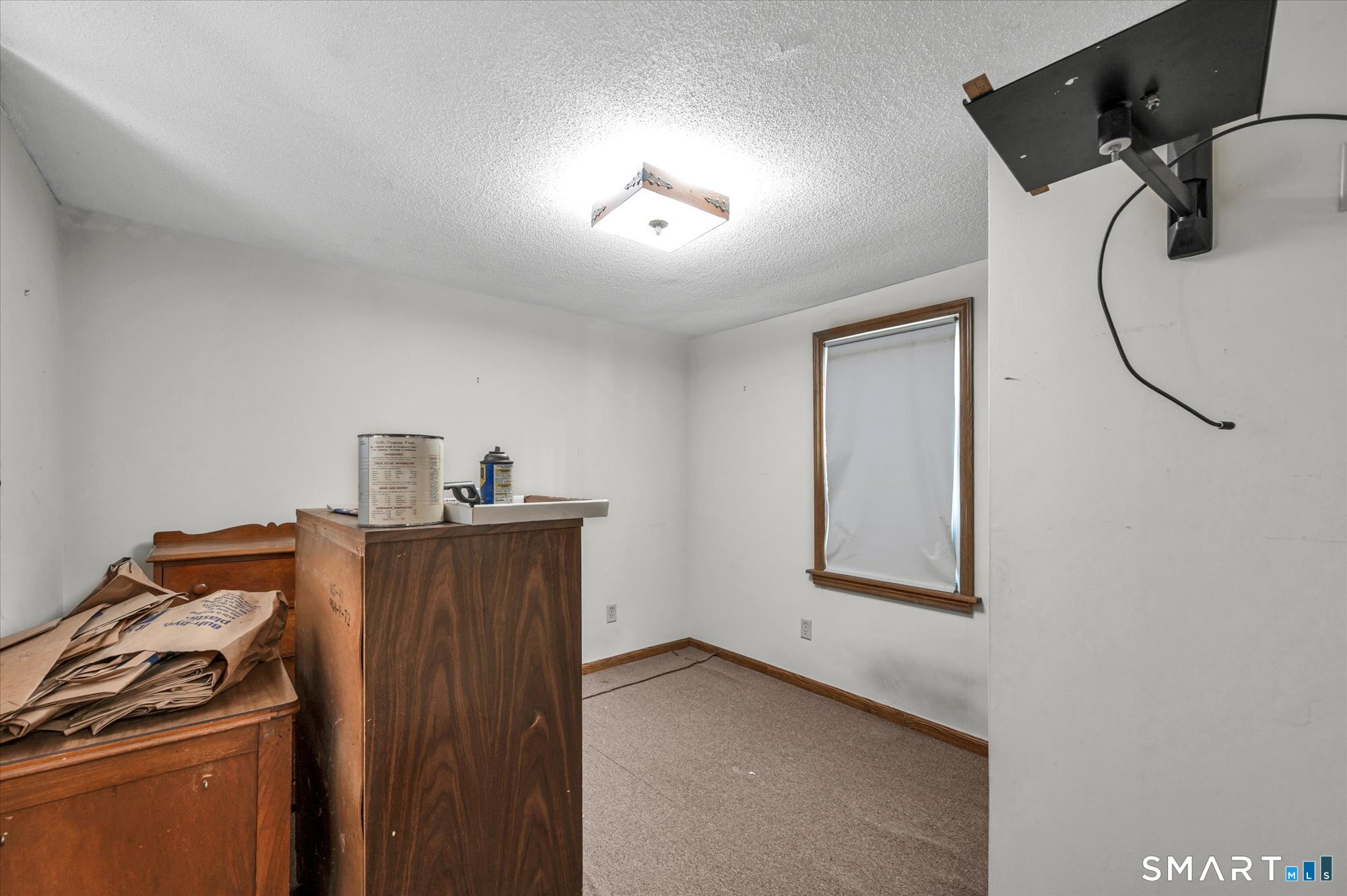 93 Torrington Avenue Canton, CT 06019 - Photo 10 of 24 a view of a livingroom with storage and utility