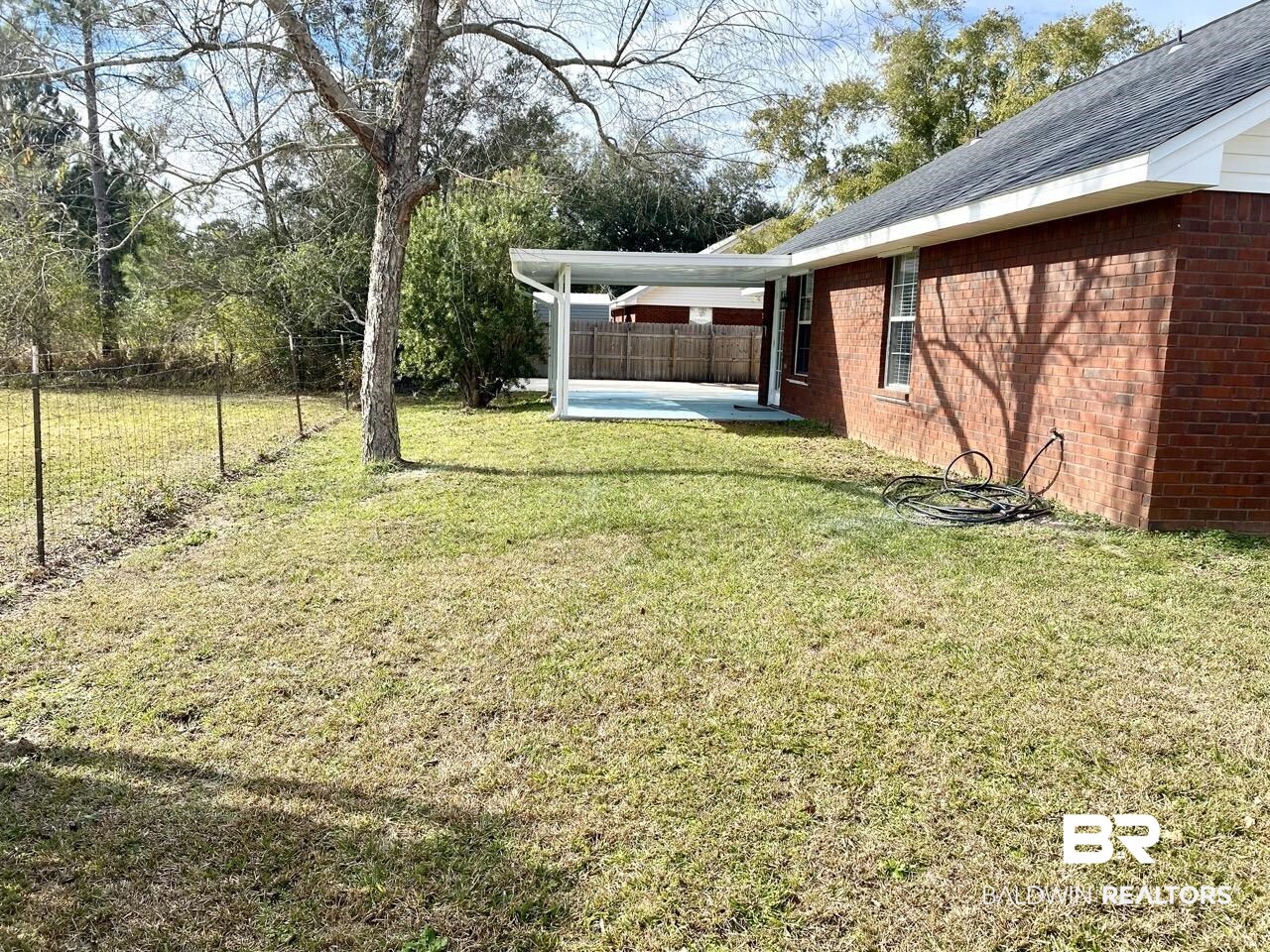 16420 Absalom Street Foley, AL 36535 - Photo 11 of 18 View of yard featuring a patio area