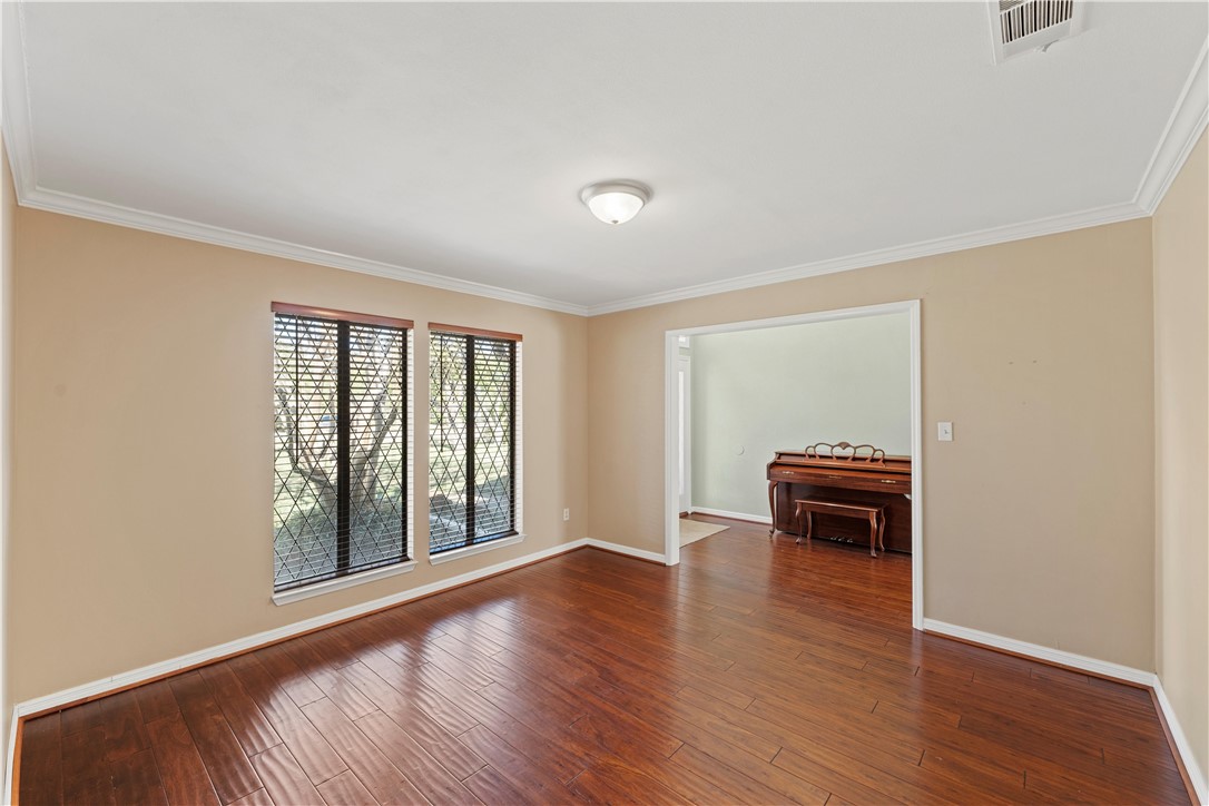 6000 Flat Rock Road Waco, TX 76708 - Photo 14 of 44 a view of room with window and wooden floor