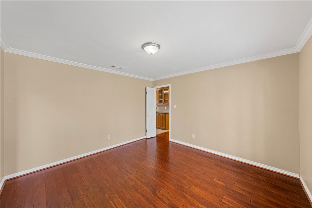 6000 Flat Rock Road Waco, TX 76708 - Photo 15 of 44 a view of an empty room with wooden floor