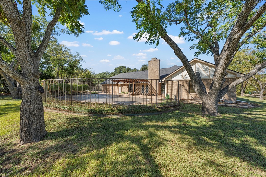 6000 Flat Rock Road Waco, TX 76708 - Photo 35 of 44 a view of a house with a yard