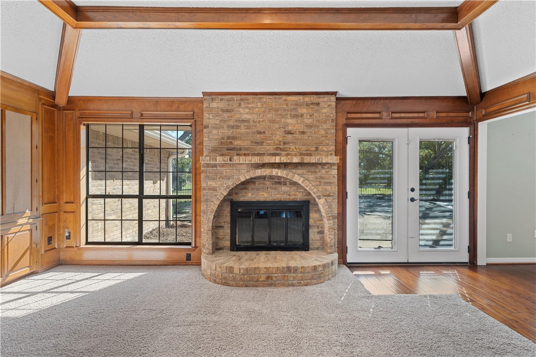 6000 Flat Rock Road Waco, TX 76708 - Photo 7 of 44 a view of an empty room with fireplace and a window