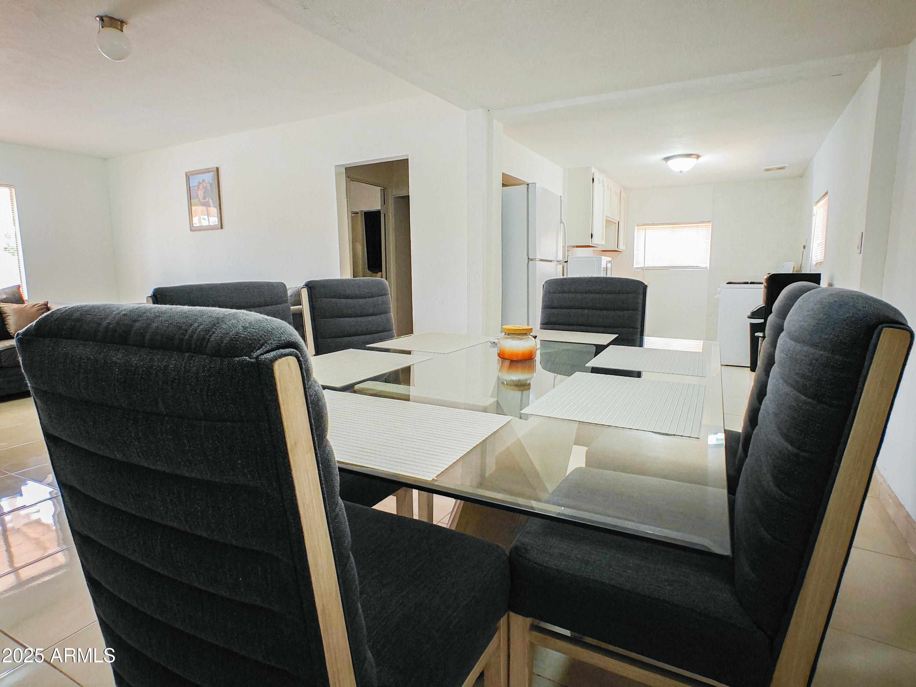 750 A Avenue Douglas, AZ 85607 - Photo 14 of 19 a living room with furniture and a flat screen tv