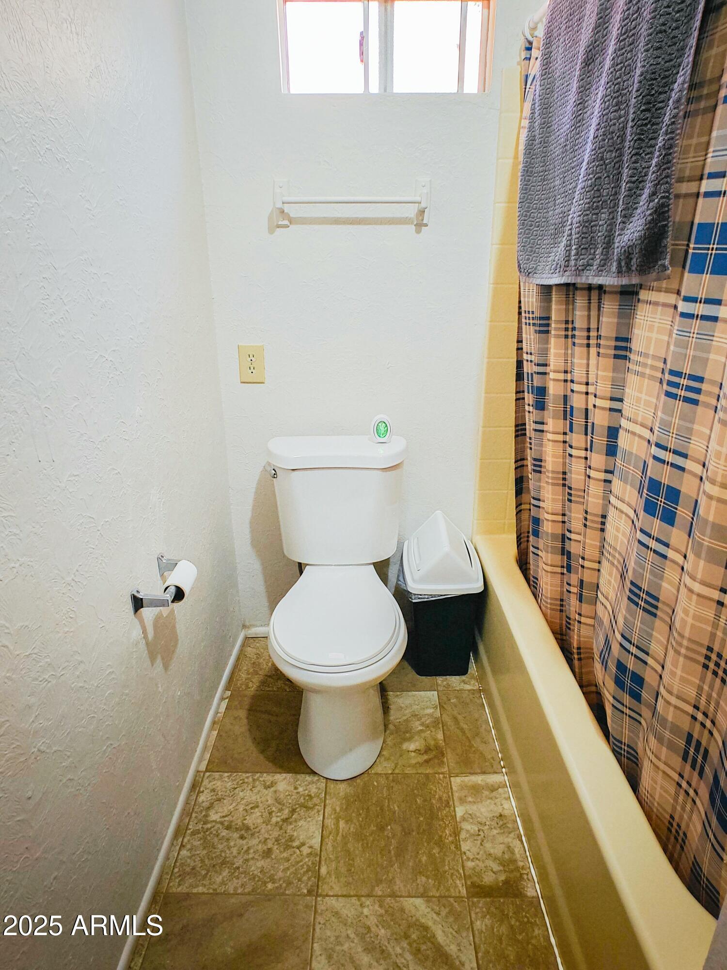 750 A Avenue Douglas, AZ 85607 - Photo 16 of 19 a bathroom with a toilet and a shower