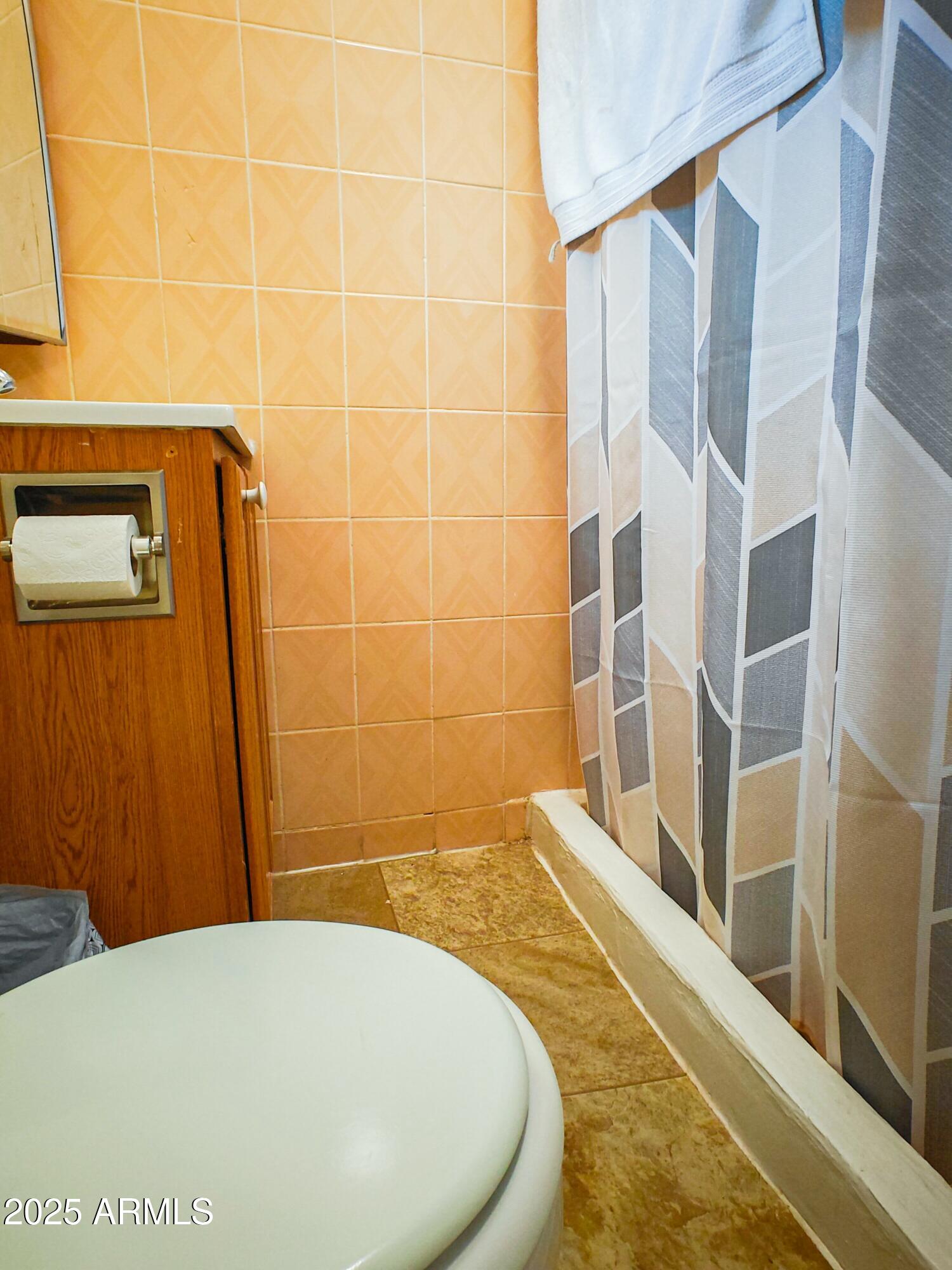 750 A Avenue Douglas, AZ 85607 - Photo 17 of 19 a bathroom with a bathtub and shower