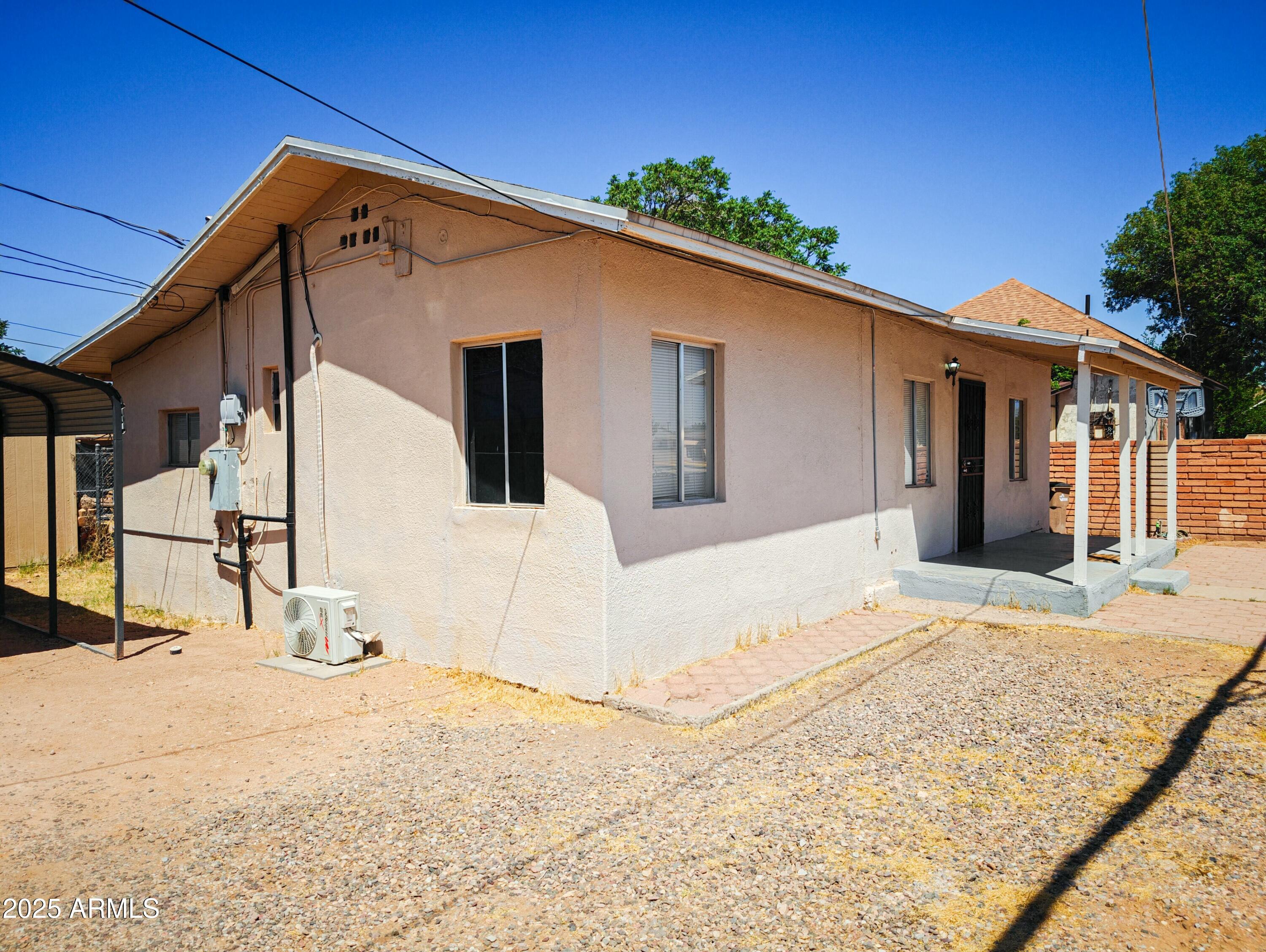 750 A Avenue Douglas, AZ 85607 - Photo 3 of 19 a view of a backyard of the house
