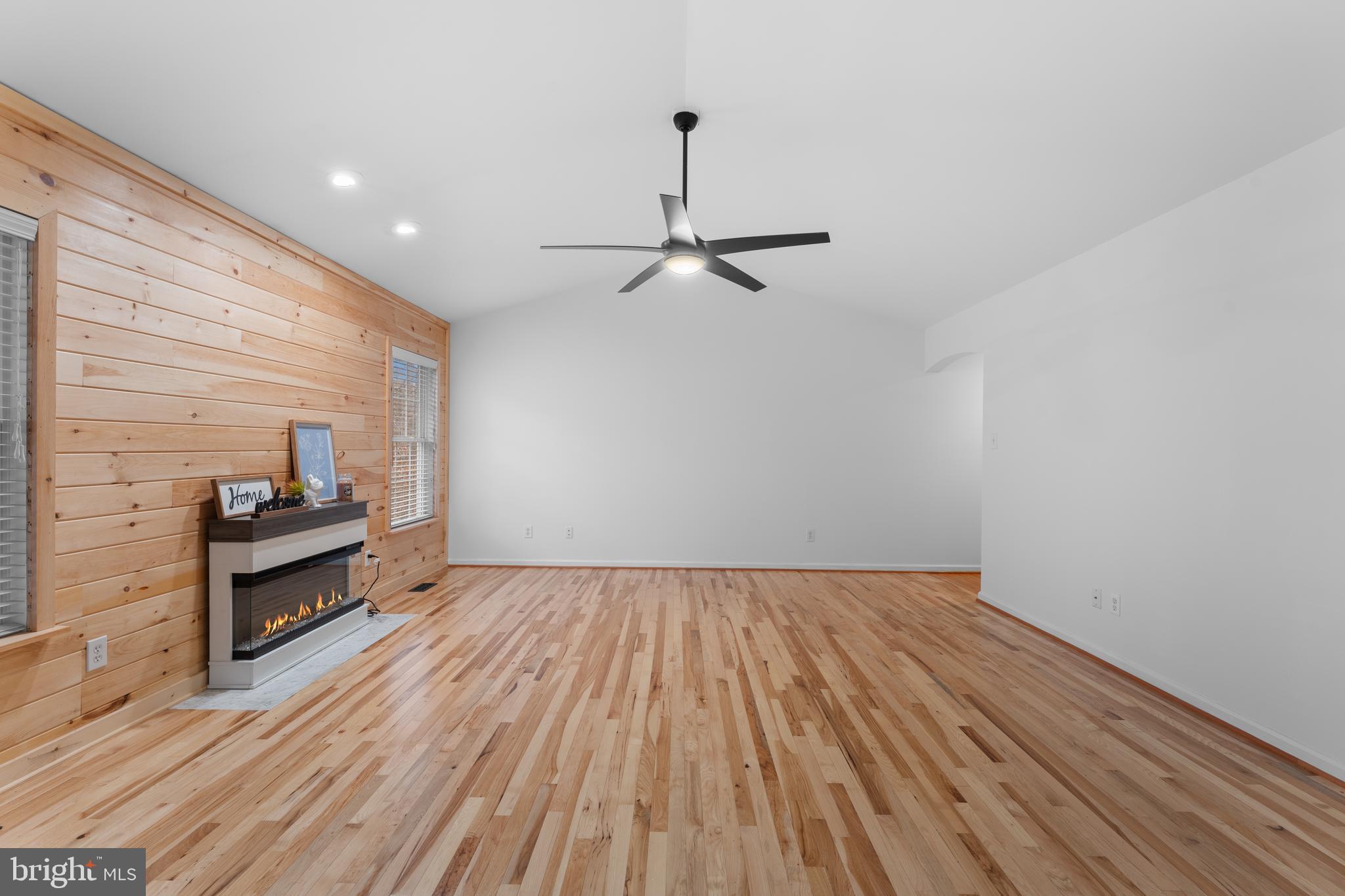 1522 Meander Run Road Locust Dale, VA 22948 - Photo 18 of 72 a view of a room with wooden floor and ceiling fan