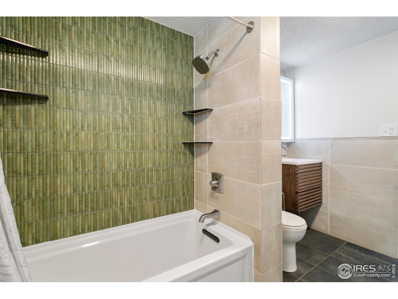 116 South Clifton Street Brush, CO 80723 - Photo 19 of 33 a bathroom with a shower and a toilet