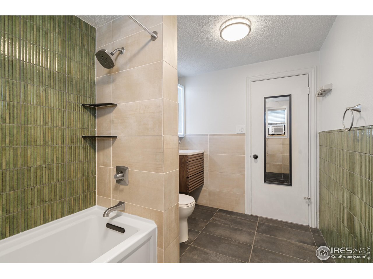 116 South Clifton Street Brush, CO 80723 - Photo 21 of 33 a bathroom with a sink and mirror