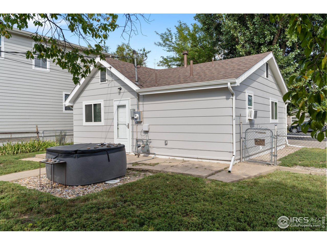 116 South Clifton Street Brush, CO 80723 - Photo 25 of 33 a view of backyard with a garden and entertaining space