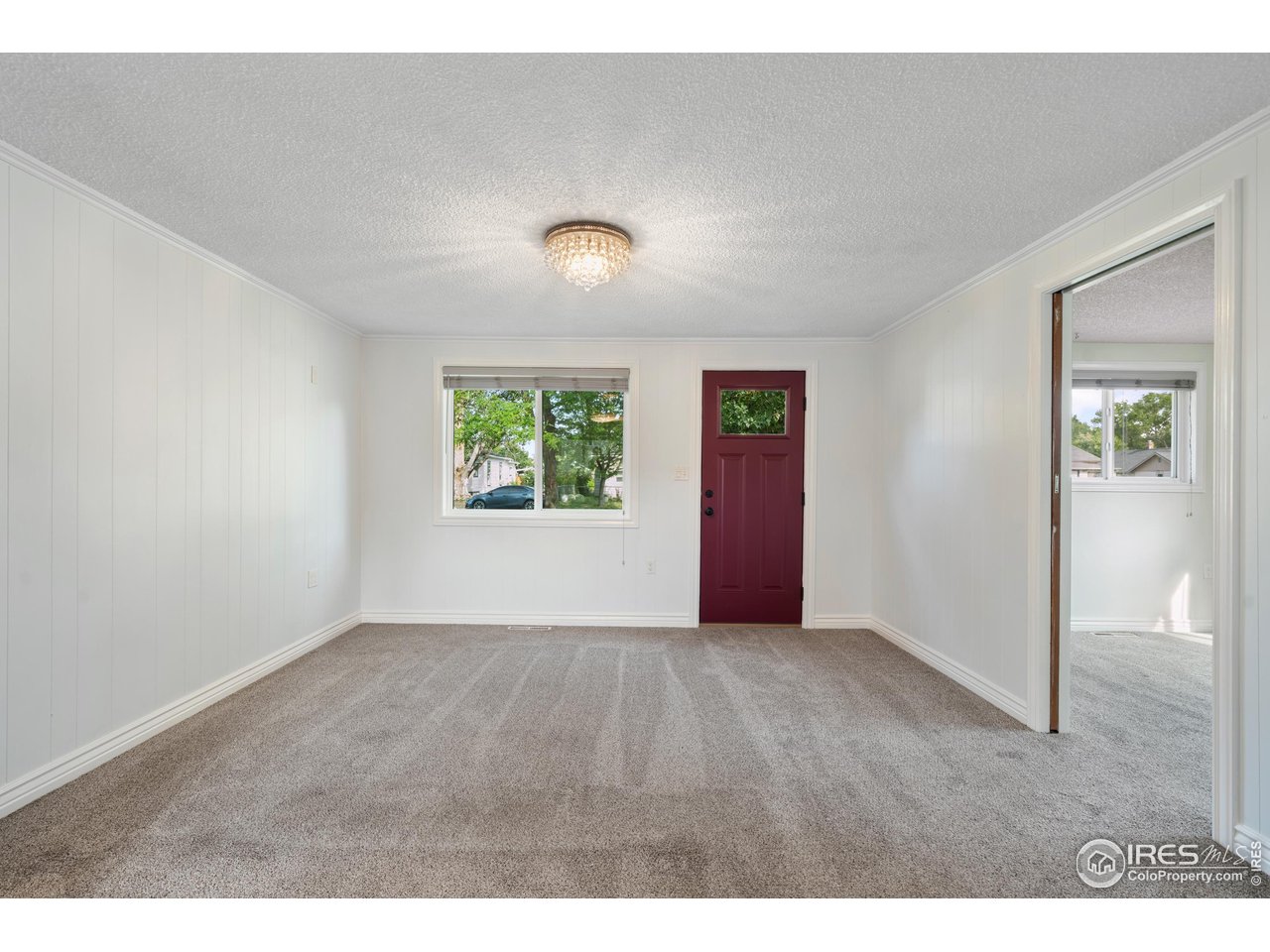 116 South Clifton Street Brush, CO 80723 - Photo 5 of 33 a view of an empty room with a window