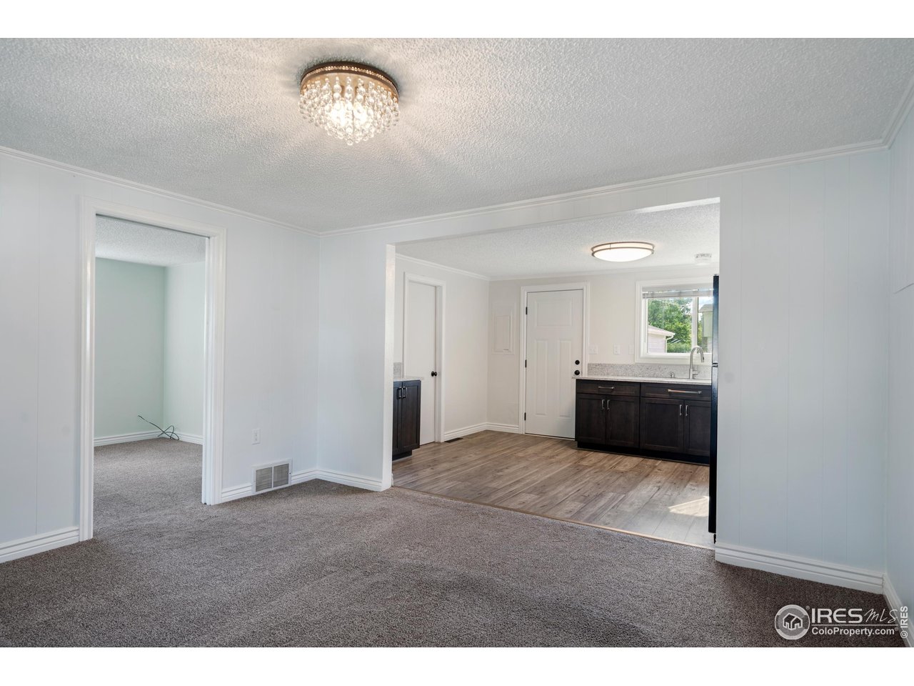 116 South Clifton Street Brush, CO 80723 - Photo 7 of 33 a view of an empty room with a window