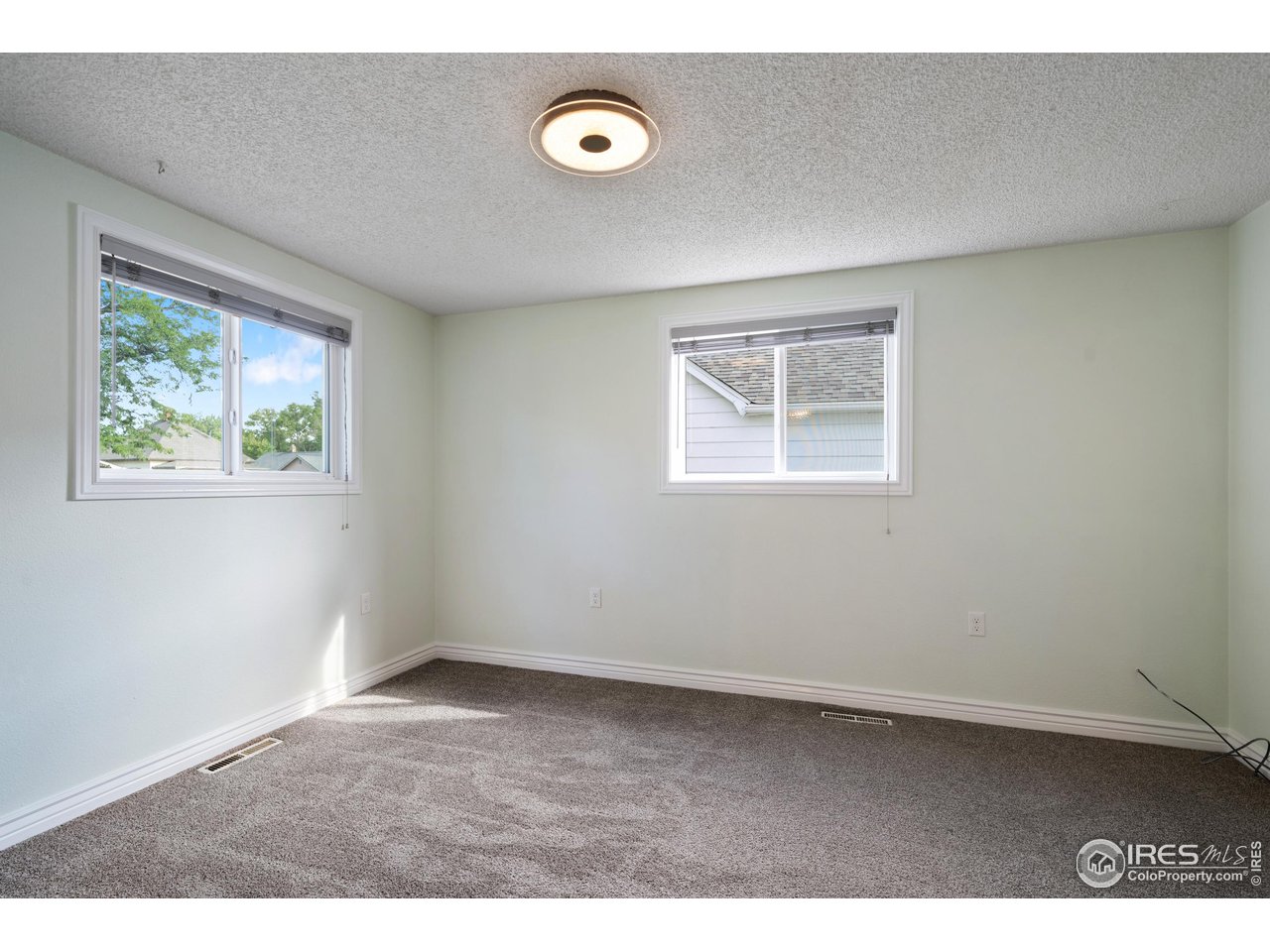 116 South Clifton Street Brush, CO 80723 - Photo 10 of 33 a view of an empty room with a window