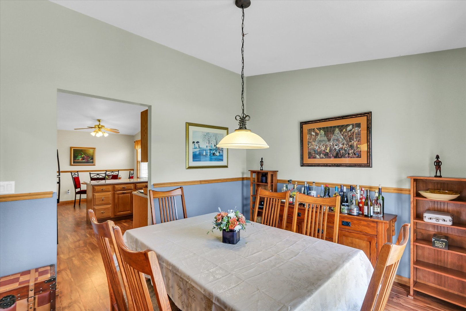 3110 Ridge Park Road Urbana, IL 61802 - Photo 3 of 26 a view of a dining room with furniture and a chandelier