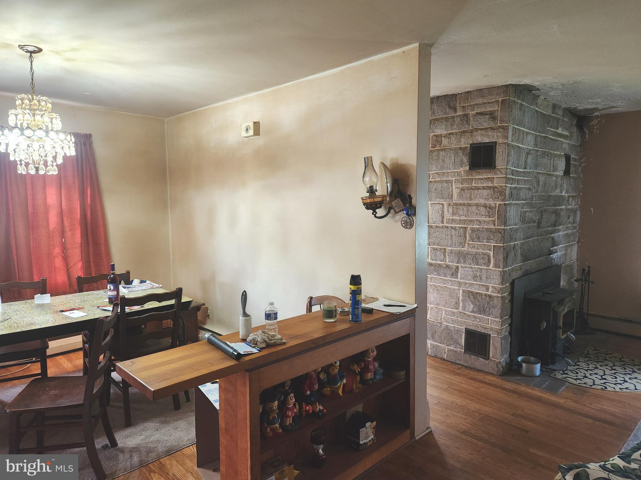 32 Bachmanville Road Hershey, PA 17033 - Photo 10 of 25 a room with a table chairs and a stove