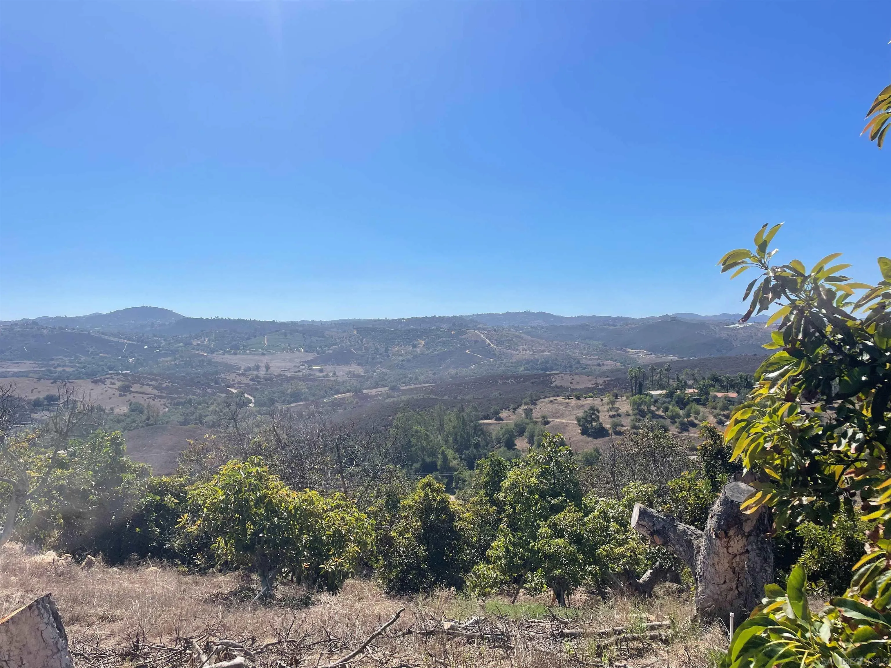 0 Courser Canyon Rd Valley Center, Unit 40 Valley Center, CA 92082 - Photo 1 of 4 a view of a houses with a yard and mountain view