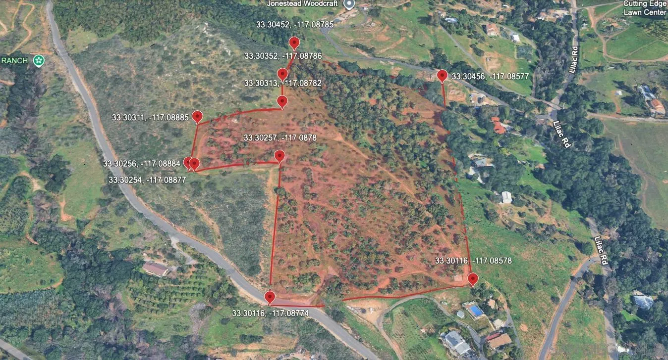 0 Courser Canyon Rd Valley Center, Unit 40 Valley Center, CA 92082 - Photo 2 of 4 a small yard with red white house