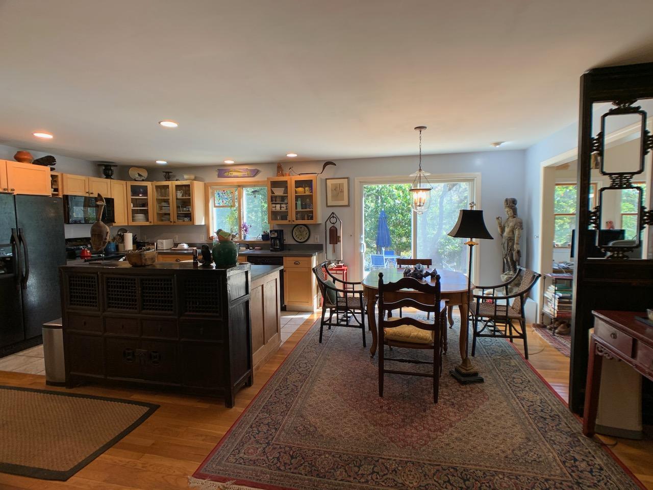 9 Sandy Lane Truro, MA 02666 - Photo 3 of 13 a view of a dining room with furniture