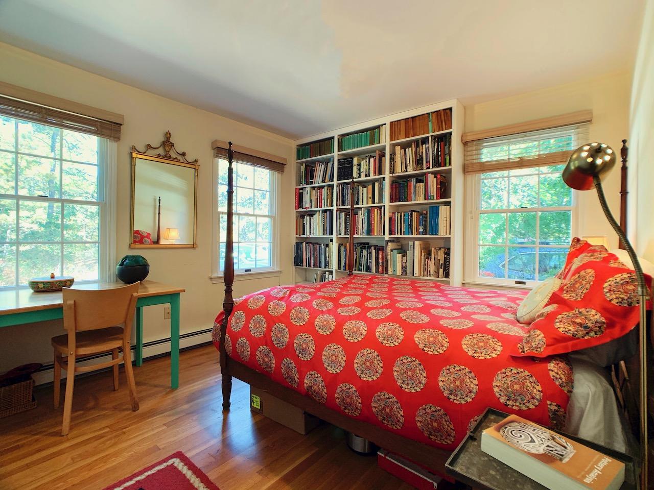9 Sandy Lane Truro, MA 02666 - Photo 7 of 13 a bedroom with a bed and wooden floor