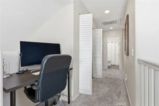 a view of a park with swings and slides