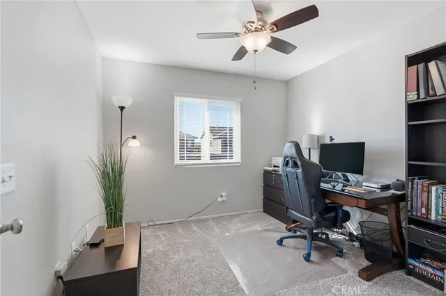 a view of balcony with wooden floor and fence