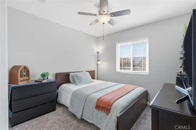 a view of a swimming pool with chairs