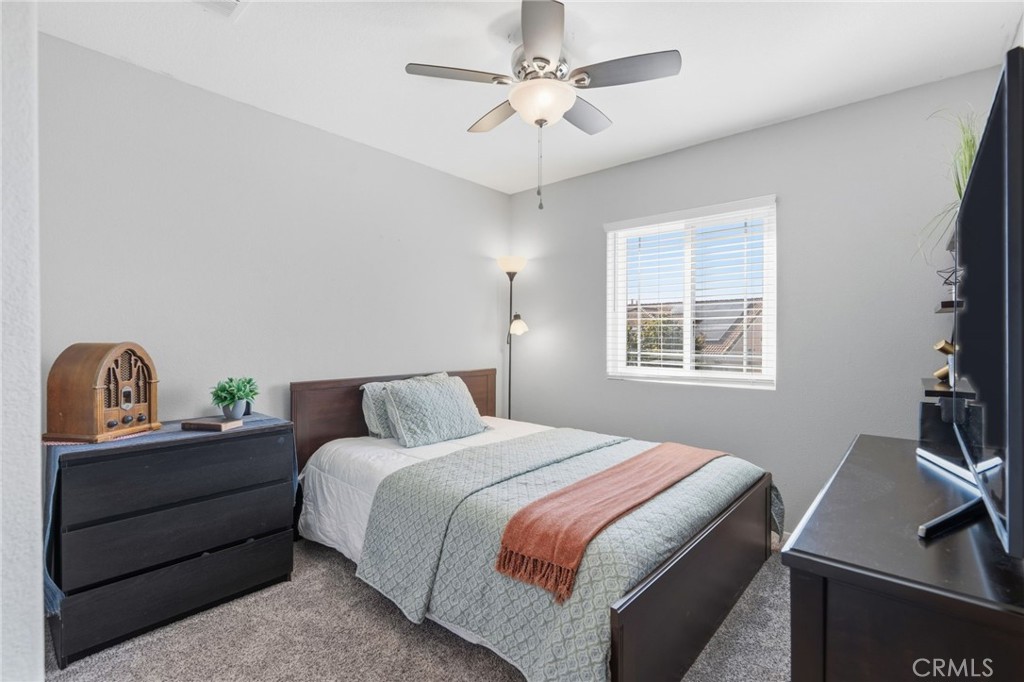 42156 Chestnut Drive Temecula, CA 92591 - Photo 19 of 33 a bedroom with bed and a window