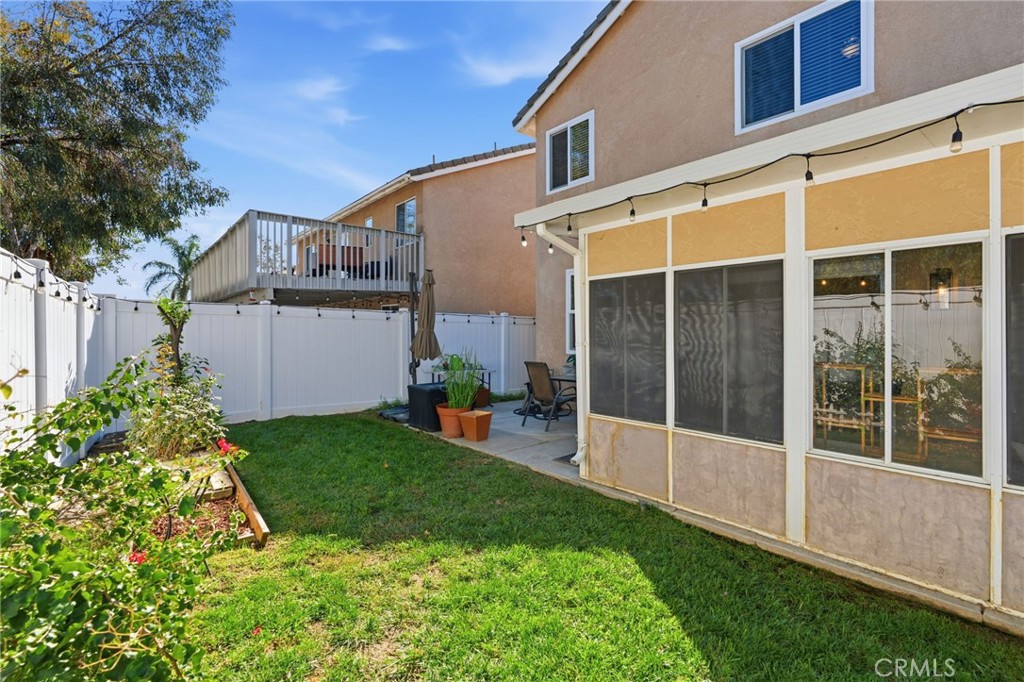 42156 Chestnut Drive Temecula, CA 92591 - Photo 27 of 33 a house view with a garden space