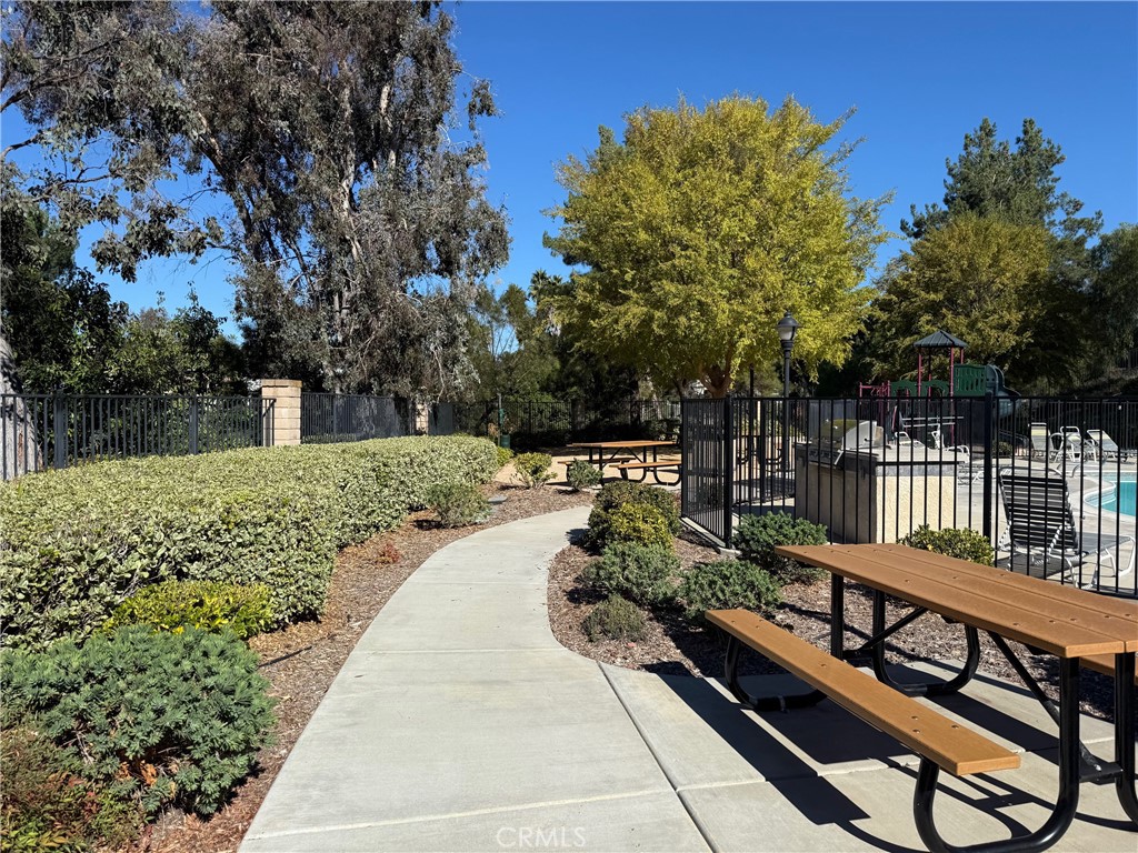 42156 Chestnut Drive Temecula, CA 92591 - Photo 31 of 33 a view of balcony with wooden floor and fence
