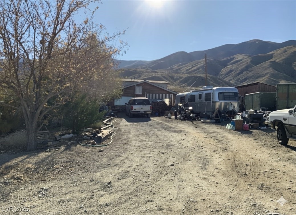 View of yard with a mountain view
