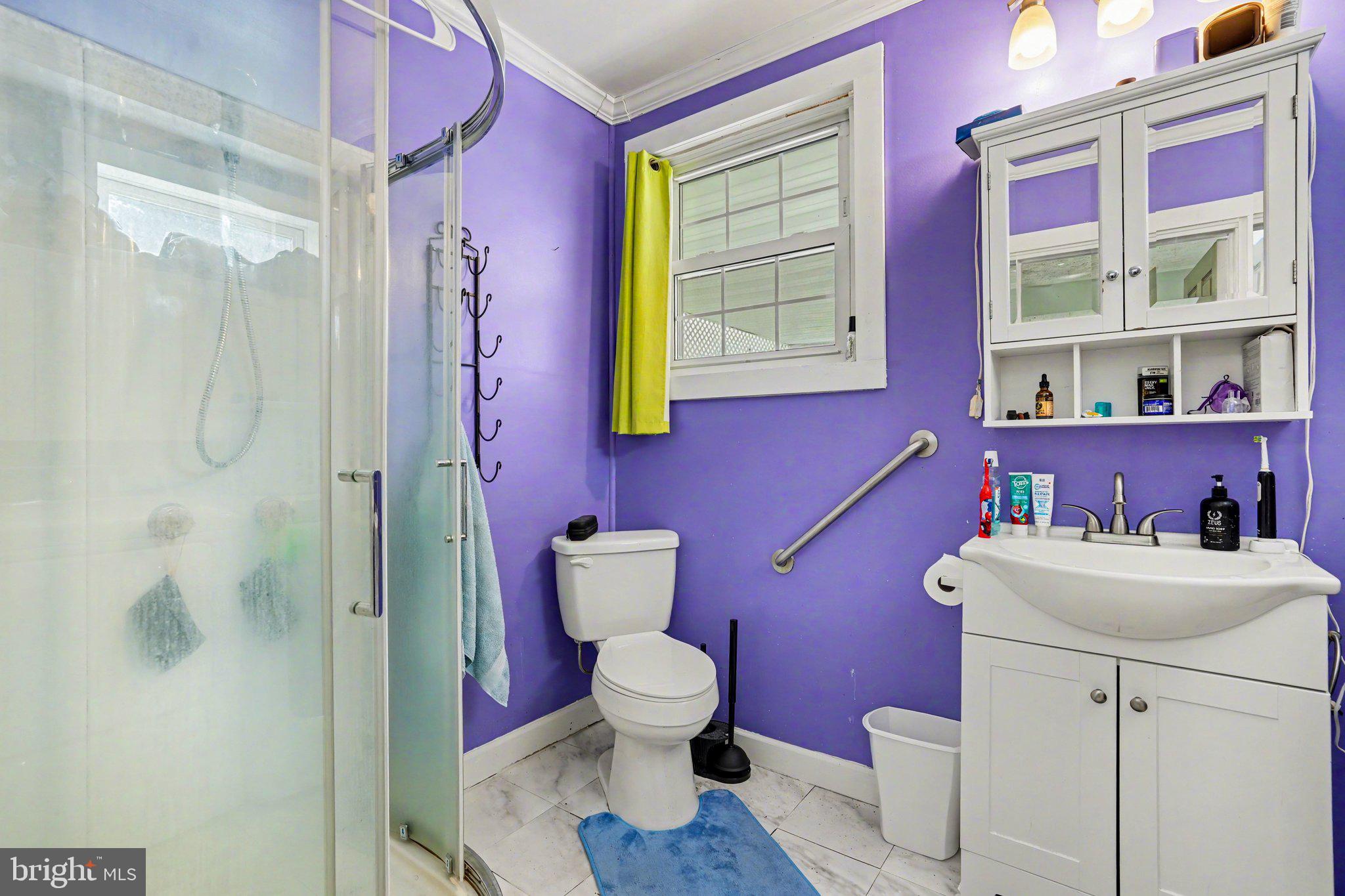 116 West Broad Street Elizabethville, PA 17023 - Photo 11 of 28 a bathroom with a sink toilet mirror and vanity