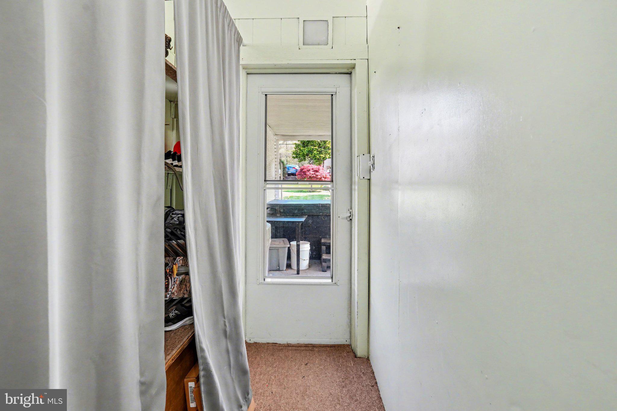 116 West Broad Street Elizabethville, PA 17023 - Photo 19 of 28 a view of a hallway with wooden shelves and entryway