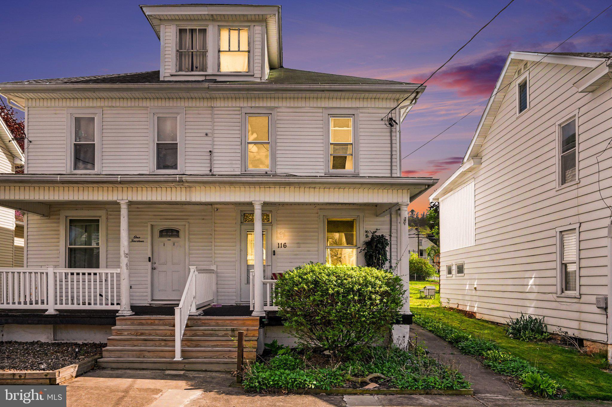 116 West Broad Street Elizabethville, PA 17023 - Photo 2 of 28 a front view of a house with a garden