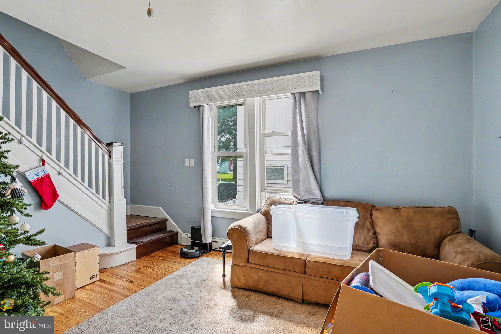 116 West Broad Street Elizabethville, PA 17023 - Photo 4 of 28 a living room with furniture and a couch