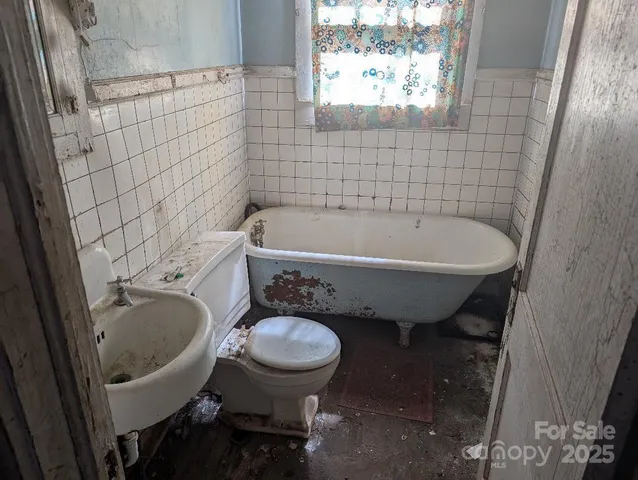a bathroom with a sink and bathtub