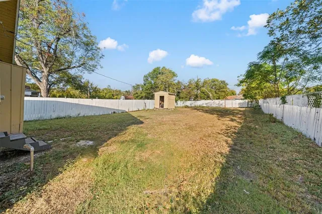 a picture of a bench in front of a wall