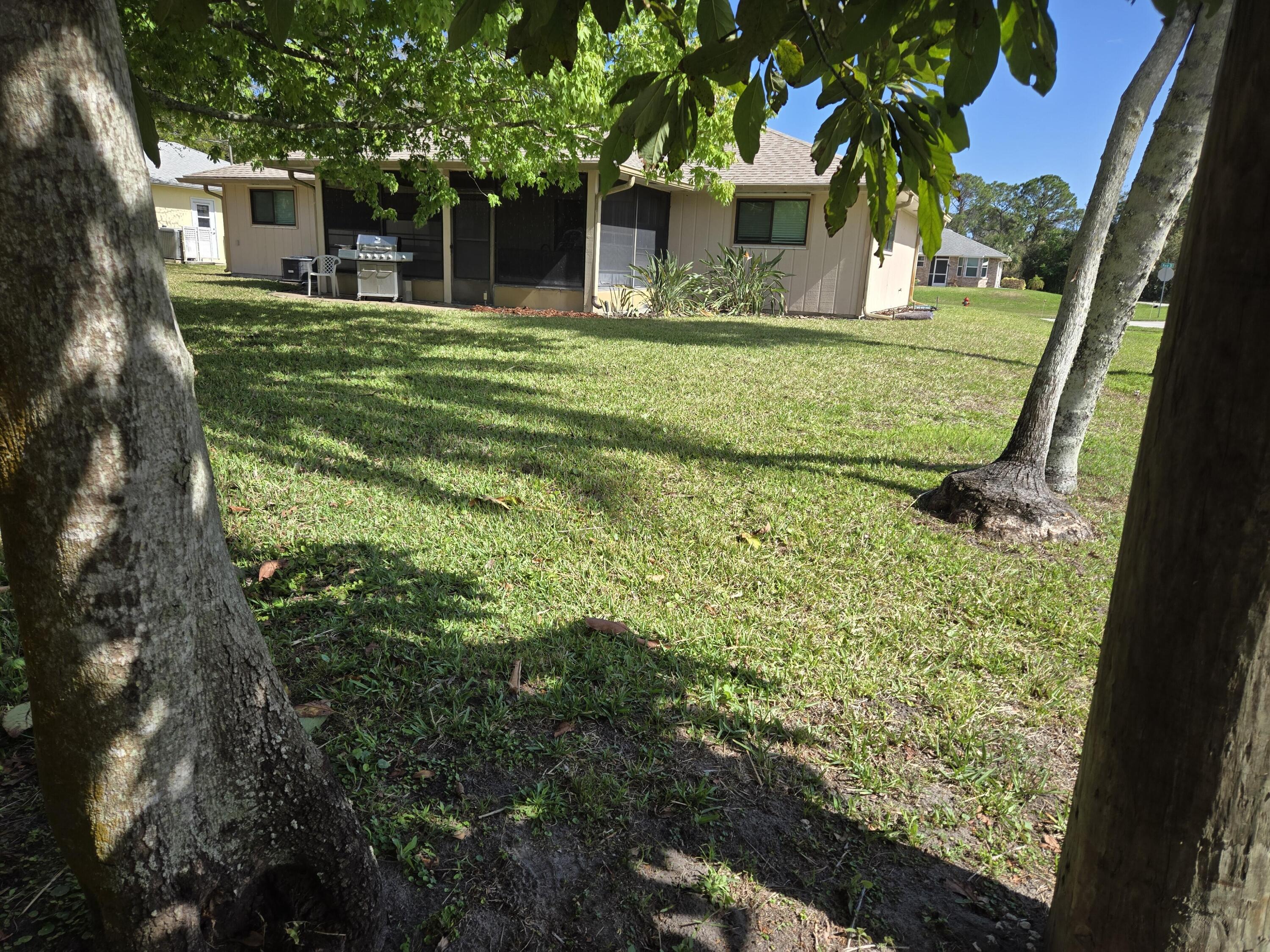390 Main Street Sebastian, FL 32958 - Photo 2 of 18 a view of a house with a yard