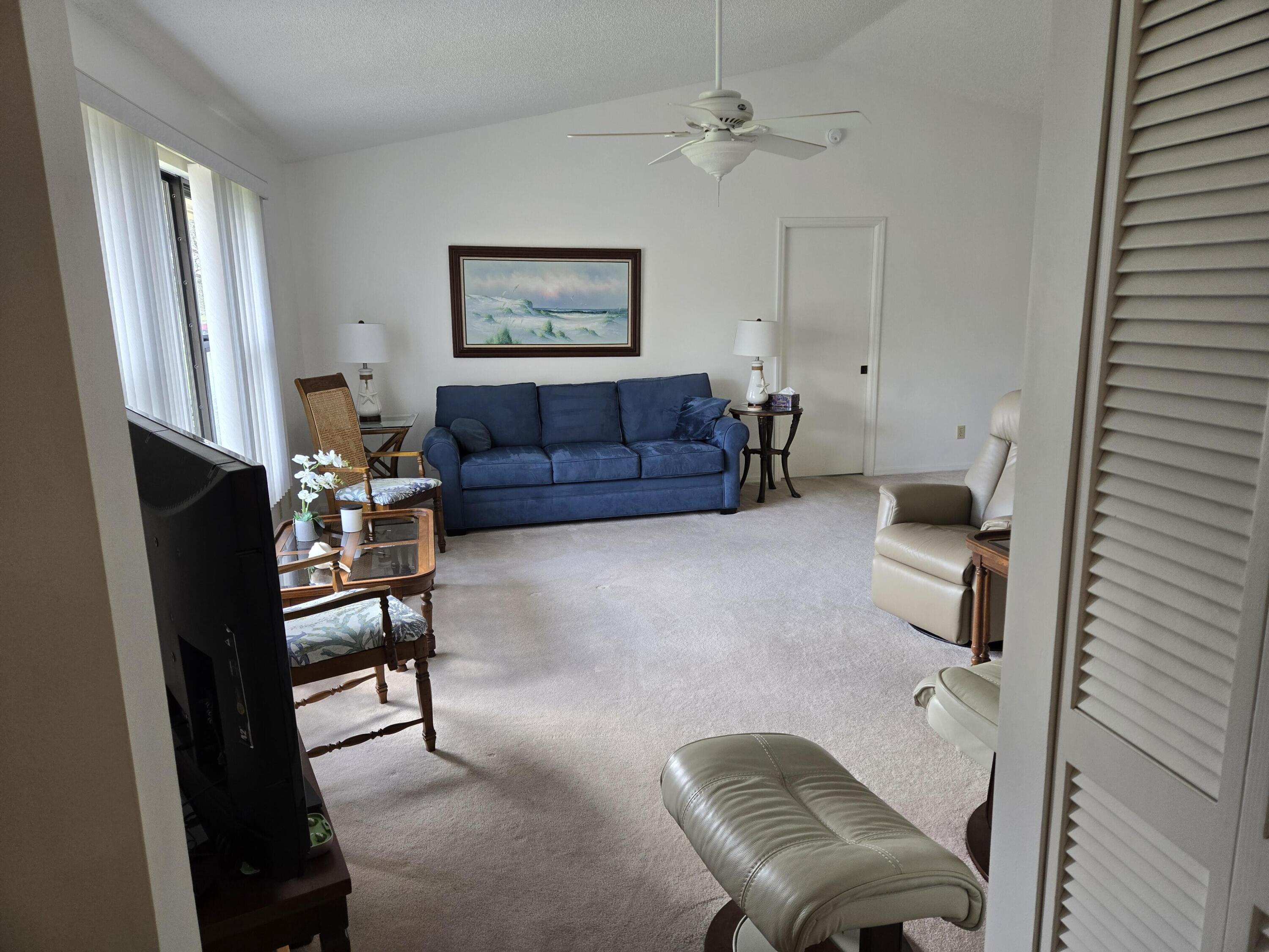 390 Main Street Sebastian, FL 32958 - Photo 7 of 18 a living room with furniture and a window