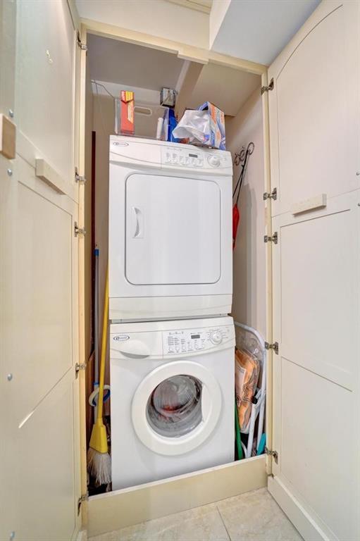 2000 South Ocean Boulevard, Unit 4C Lauderdale-by-the-Sea, FL 33062 - Photo 20 of 49 a utility room with dryer and washer