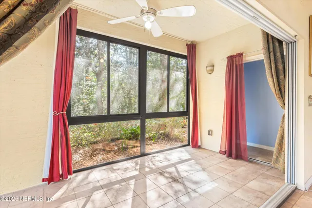 a view of a room with a large window