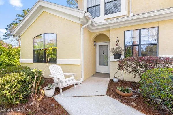 a view of a city street with a lake view