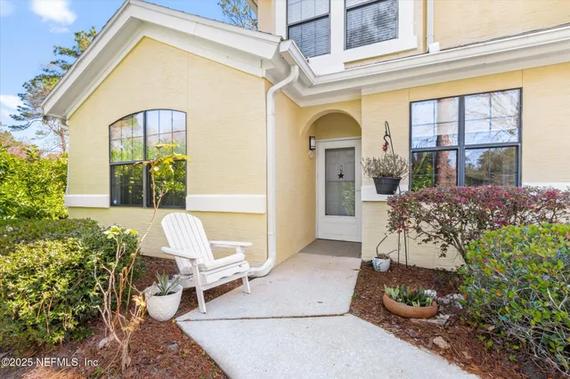 a view of a city street with a lake view