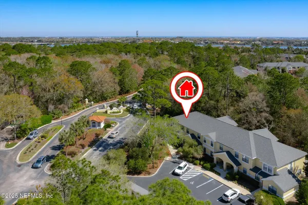 an aerial view of a and a parking space