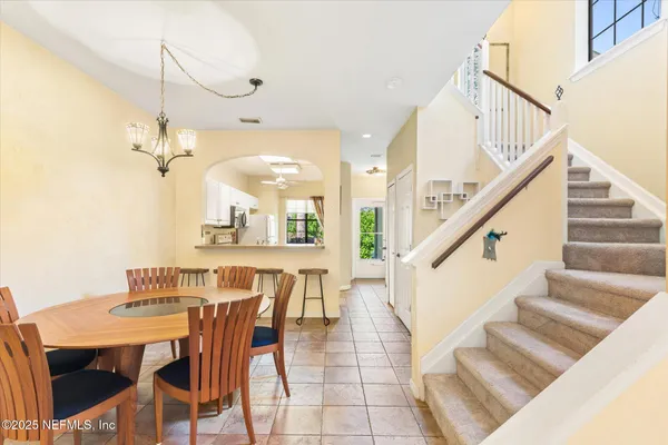 a view of a dining room with furniture