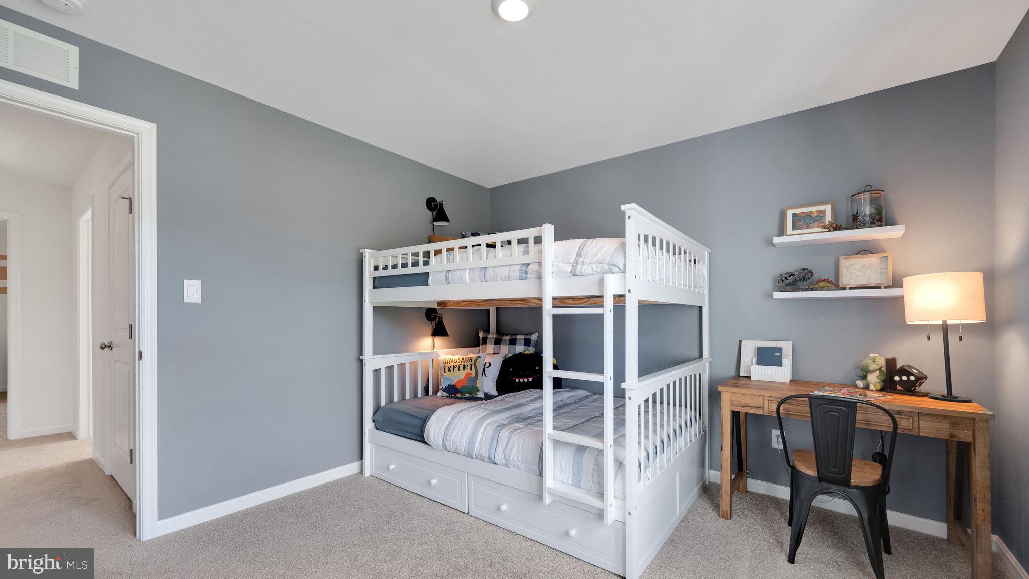 109 Pear Rdg Drive Harrisburg, PA 17111 - Photo 23 of 28 a bed room with a bed and a desk