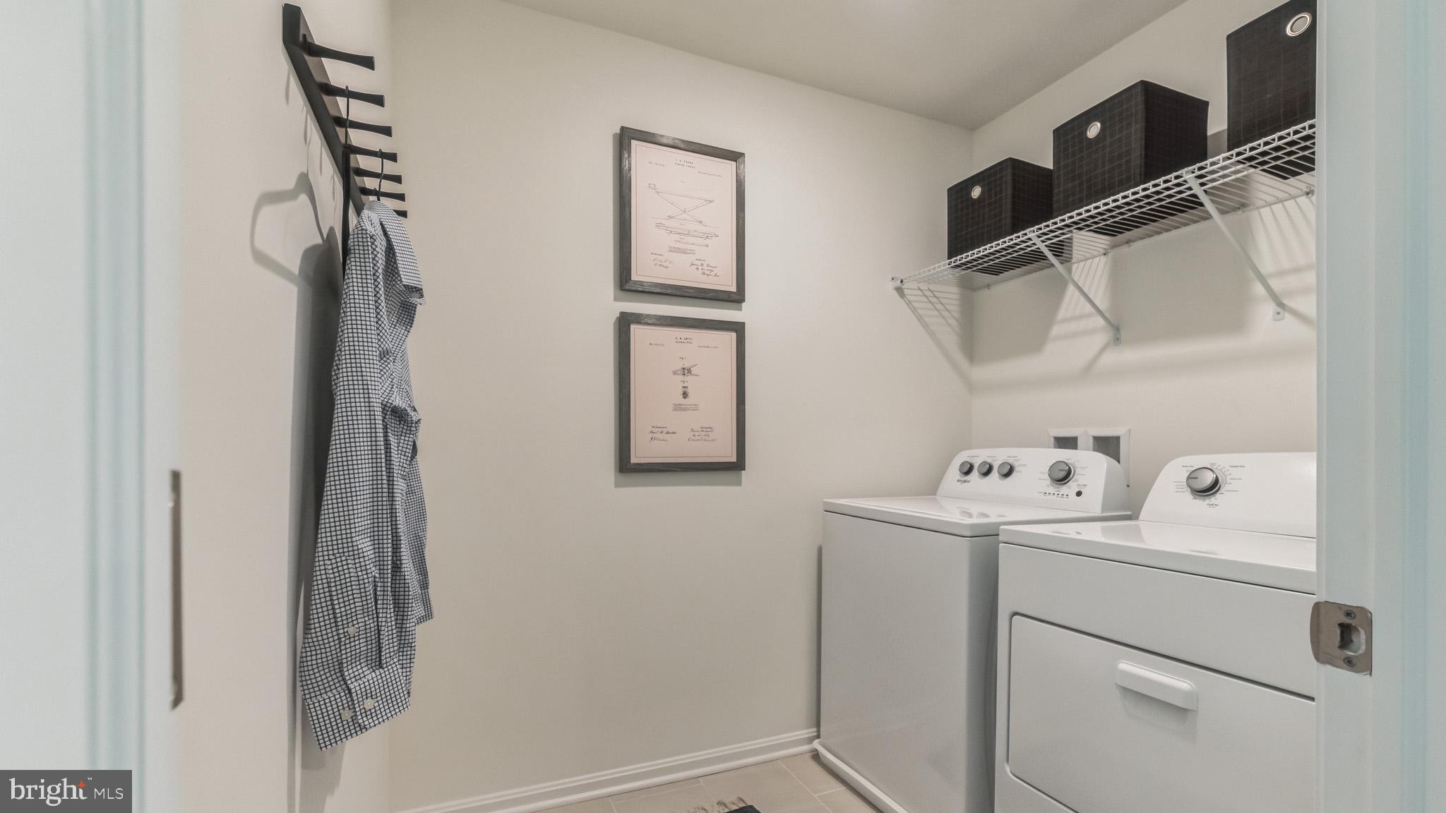 109 Pear Rdg Drive Harrisburg, PA 17111 - Photo 27 of 28 a utility room with dryer and washer