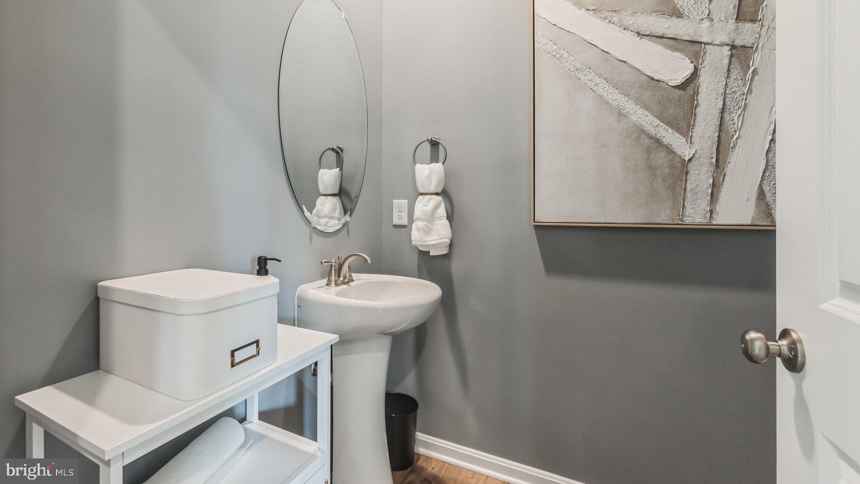 109 Pear Rdg Drive Harrisburg, PA 17111 - Photo 28 of 28 a bathroom with a toilet a sink and mirror