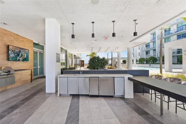 a large kitchen with lot of counter top space