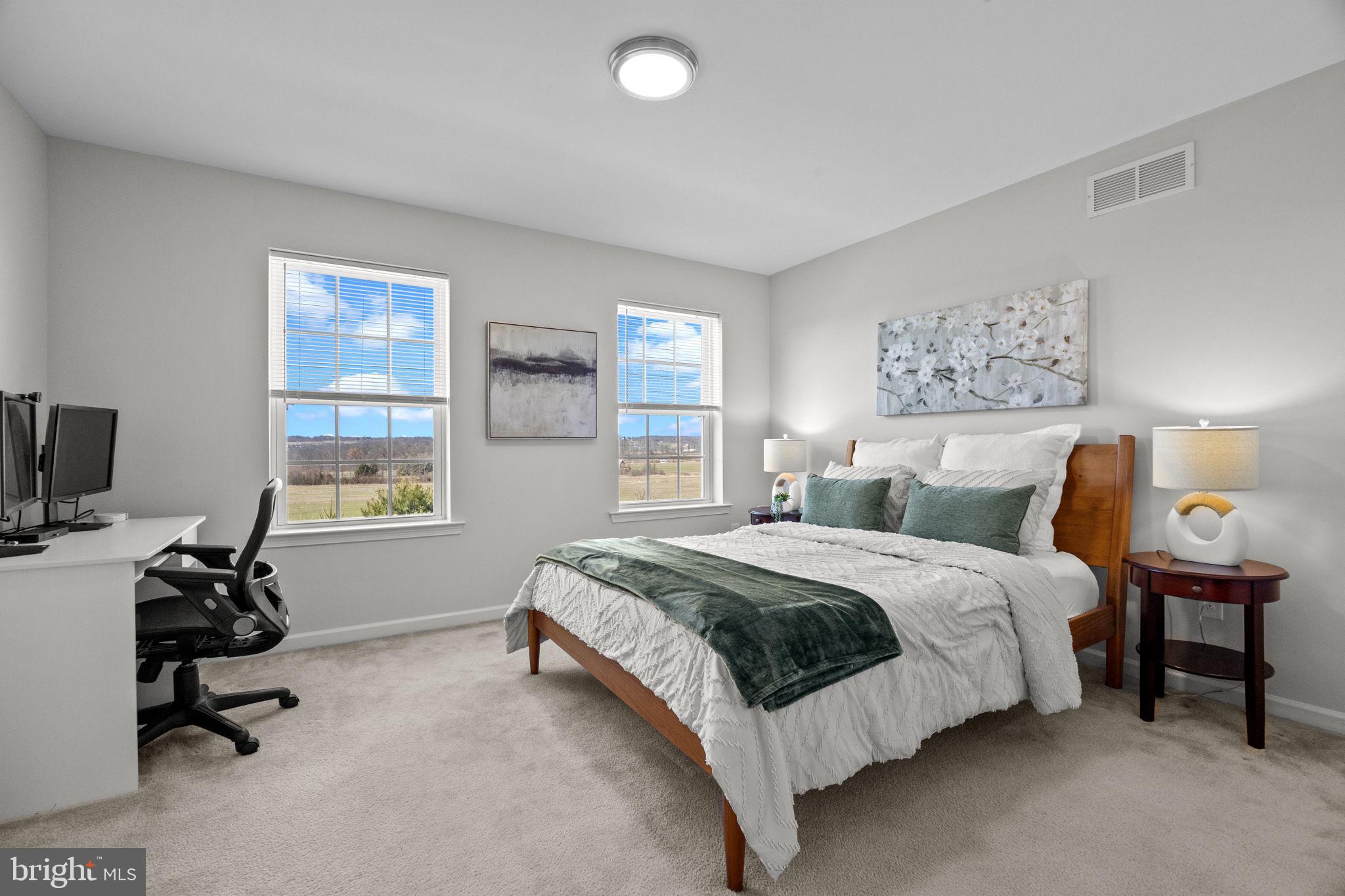 3669 Jacob Stout Road, Unit 9 Doylestown, PA 18902 - Photo 16 of 36 a spacious bedroom with a bed and a window
